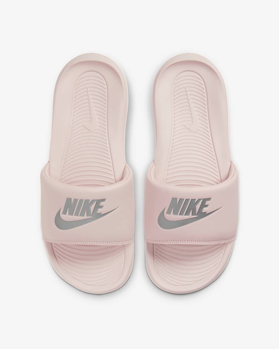 Pink and white nike flip flops on sale